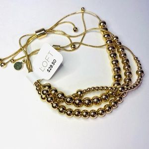 New. LOFT gold adjustable bead bracelet set